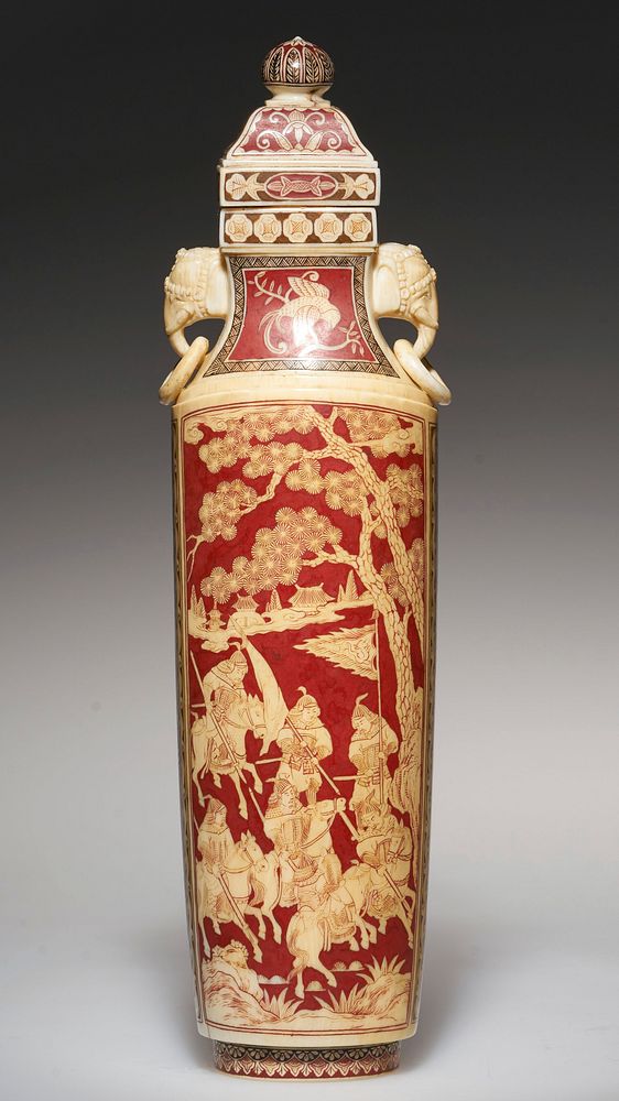 pair of covered ivory bottles, inlaid with red lacquer; heads of elephants forming handles; wooden standards. Original from…