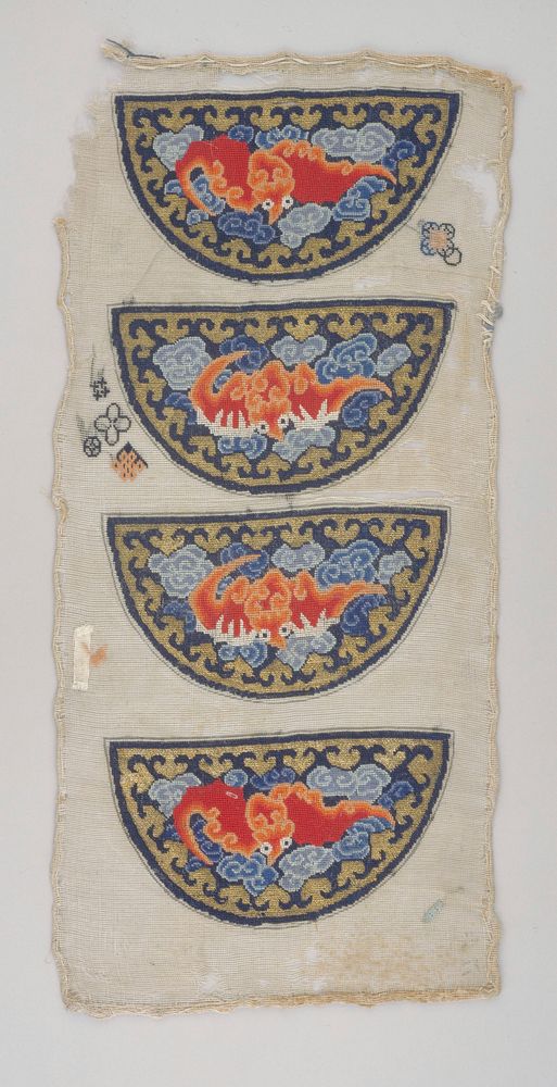 Four embroidered pieces intended for pouches on a net ground. Cloud forms and a dragon are placed on a black ground and…