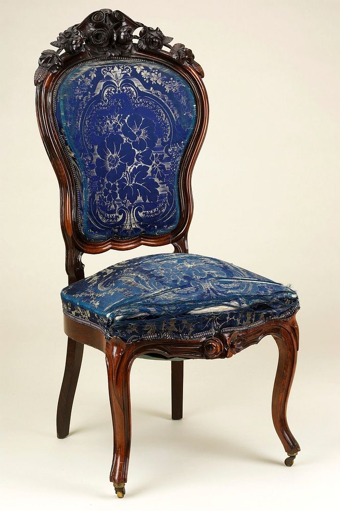 Victorian rosewood side chair, c.1860, shaped back with cresting of elaborately carved rose sprays; chair frame, at front…