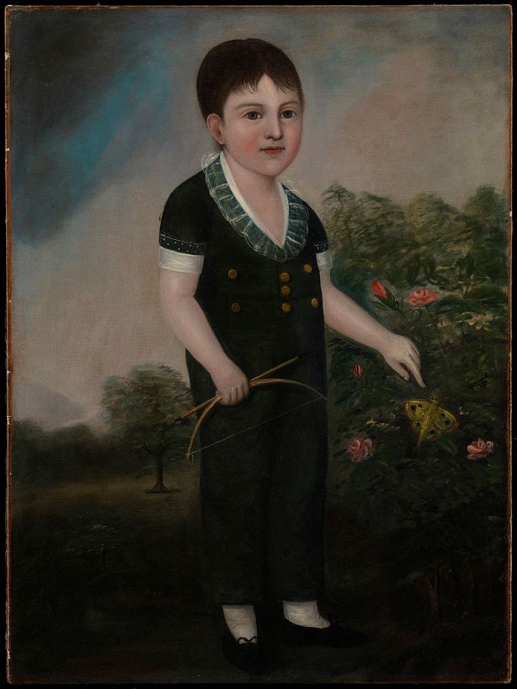 exterior garden scene; boy in green suit with lace collar and brass buttons is holding bow and arrow and pointing to a…
