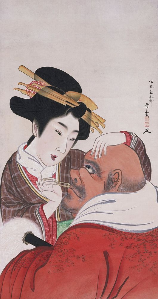 Smiling young courtesan daintily plucks at the hairs of Daruma's upper lip; courtesan wears brown and white plaid robe with…