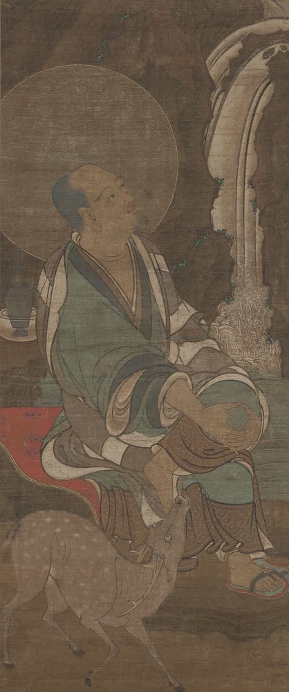 man seated with crossed knee, hands on knee, looking at waterfall on R; wearing green kimono with blue and white accents;…