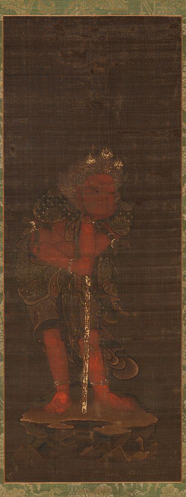 red figure with wavy, curling gold hair and a golden crown of flaming jewels; rests chin in PL hand; PL elbow propped on top…