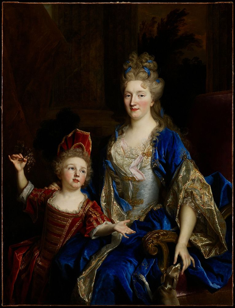 Portrait. Madame Aubry wears an ultramarine blue velvet dress, cloak lined with flowered brocade and a bodice of silver lamé…