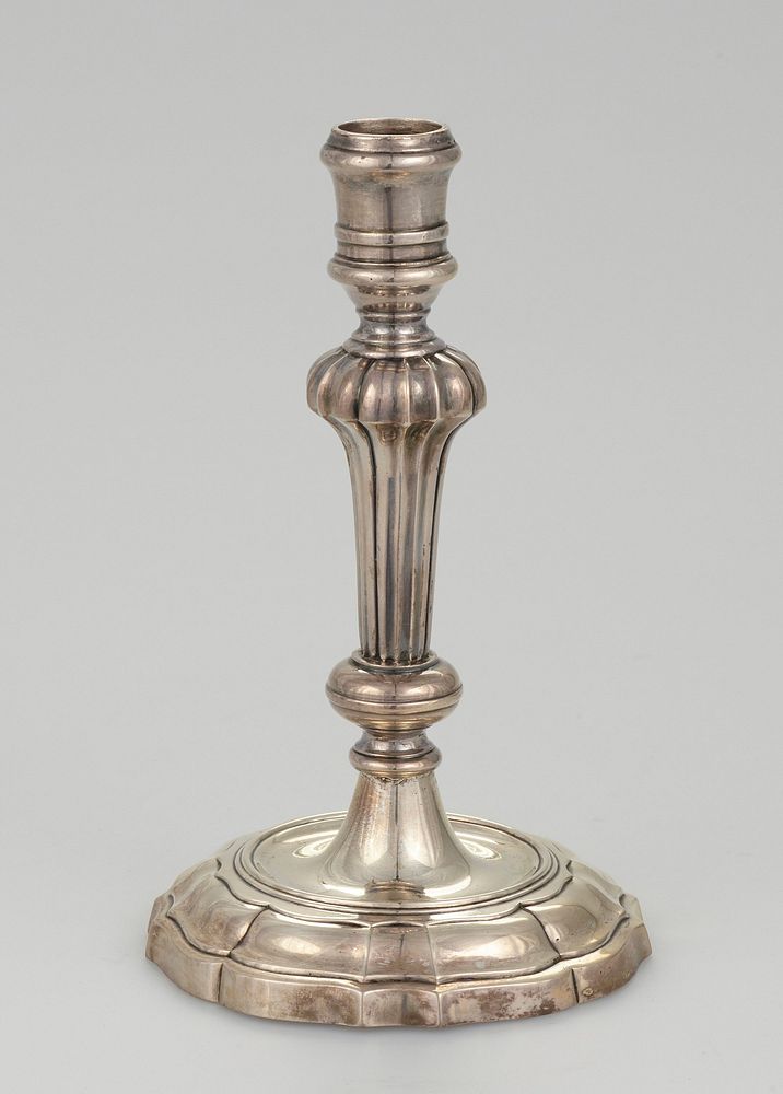 One of a pair with ribbed baluster stems and shaped circular screw-on bases. Original from the Minneapolis Institute of Art.