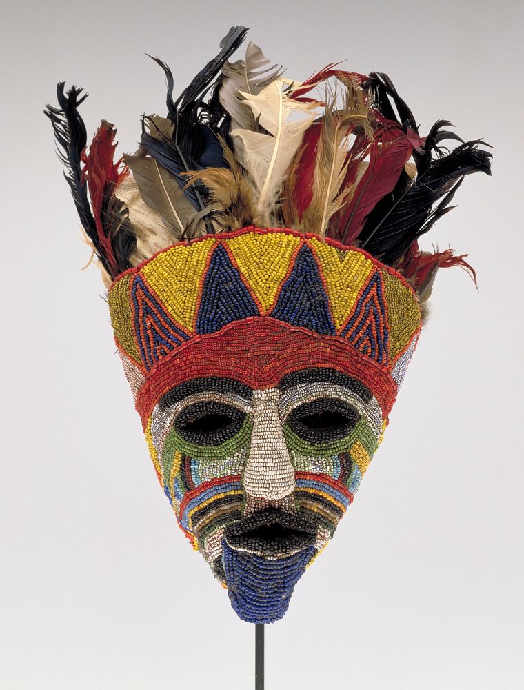 Tabwa Mask, colored glass beads, feathers, cloth raffia and skin, Zambia late XIX-early XXc.. Original from the Minneapolis…