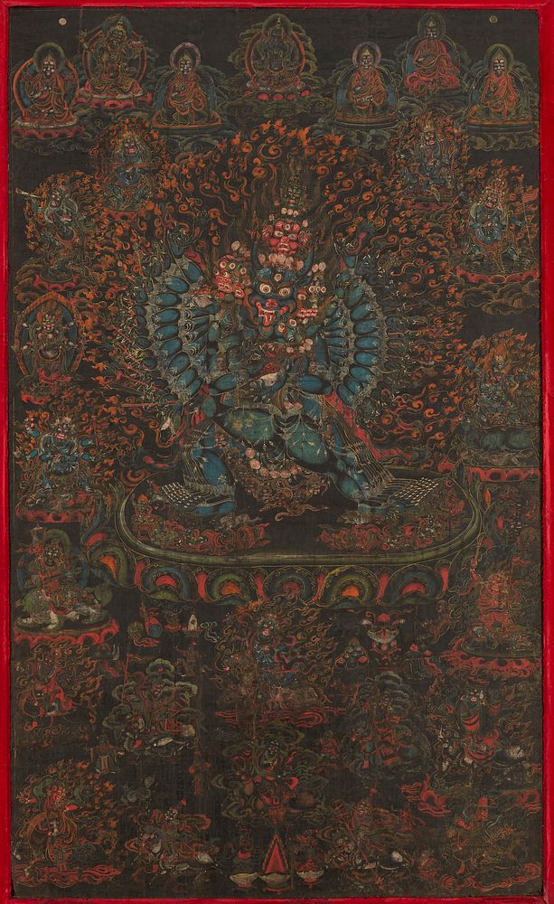 Rare black-ground thanka features the ferocious protective deity Vajrabhairava locked in cosmic embrace with his sakti, or…