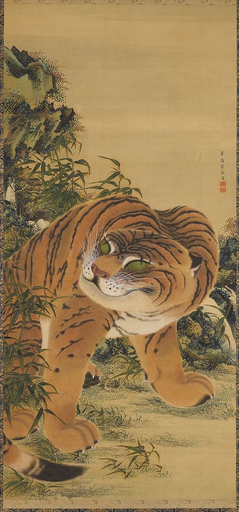 Seated tiger with head turned to PR; ears back; rocks on L and foliage all around; beige and blue and gold brocade border.…