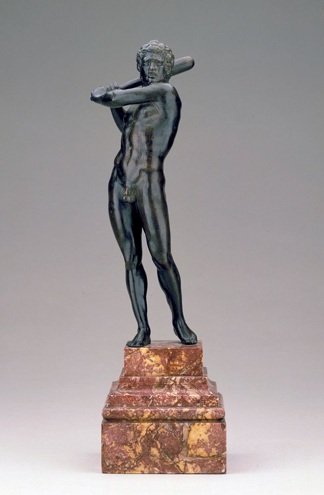 Male nude, depiction of Hercules; stands with his club swung over his right shoulder and his weight on his right foot; the…