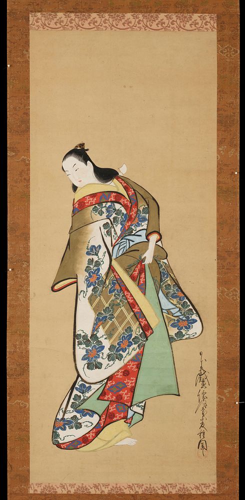 Standing female figure looking down to the left and holding up her robes at the waist with her left hand. Her outermost robe…