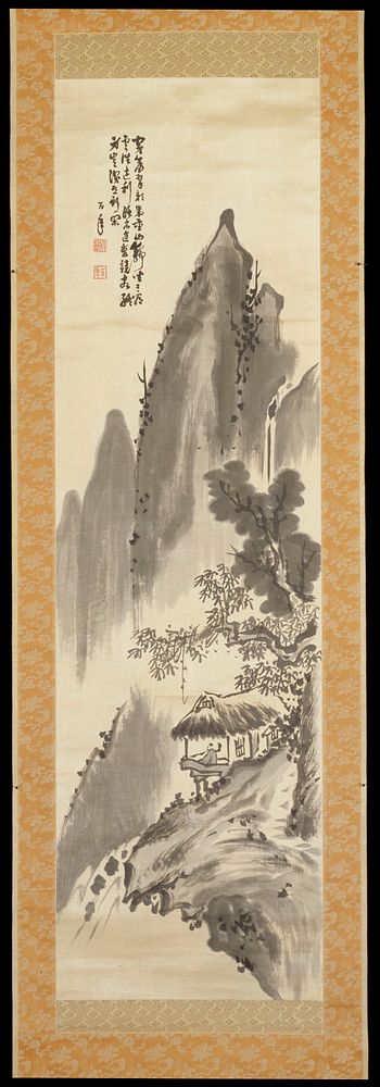 Dark ink wash landscape of a scholar in a hut on a mountainside overlooking a waterfall; tall spiky peaks dominate the…