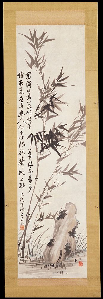 two long slender stalks of bamboo grow from the left corner; left of bamboo is a lichen-covered rock; two lines of Chinese…