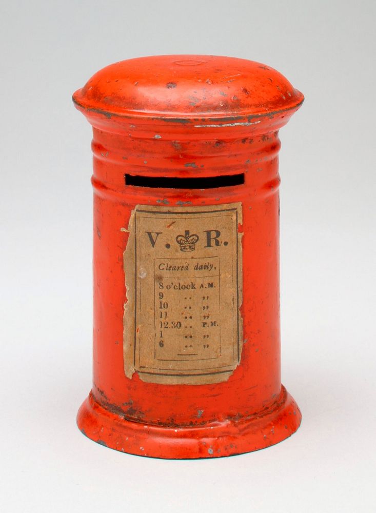 cylindrical form; orange overall; paper "collection" label below coin slot. Original from the Minneapolis Institute of Art.