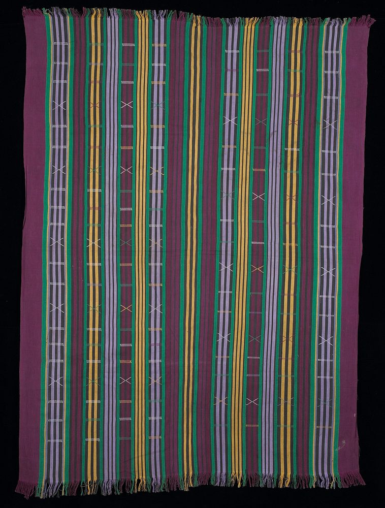vertical striped pattern of purple, green, yellow and black with alternating narrow stitchings of horizontal bars and Xs;…