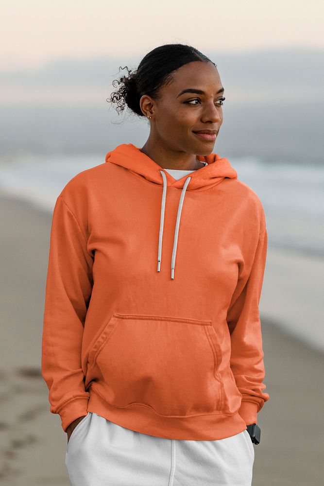 Woman wearing plain orange hoodie
