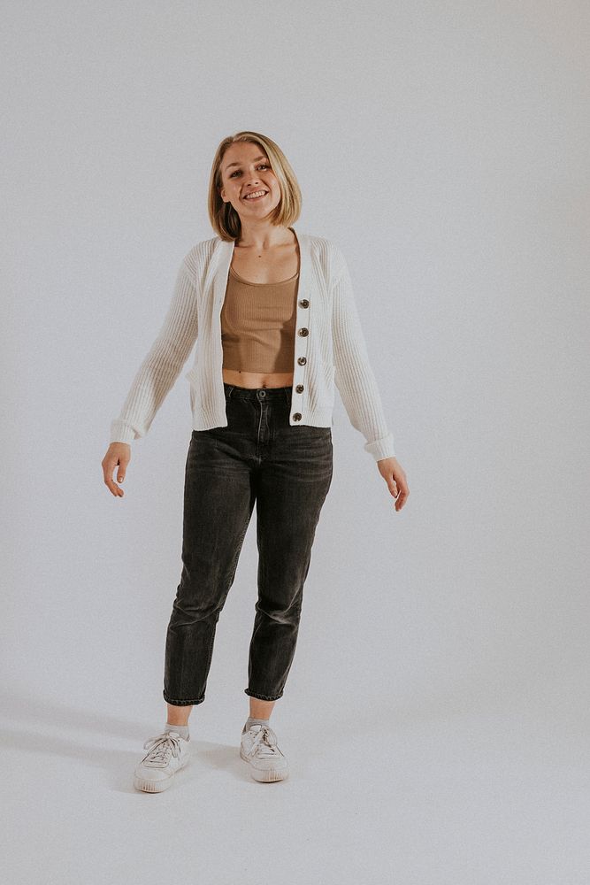 Women's casual outfit, crop top, jeans and cardigan