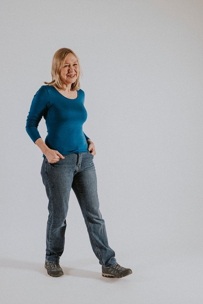 Mature woman in blue t-shirt and jeans