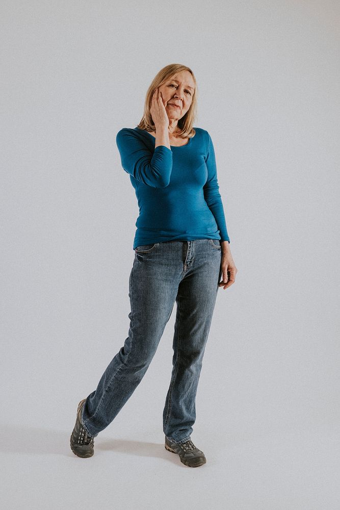 Mature woman in blue t-shirt and jeans