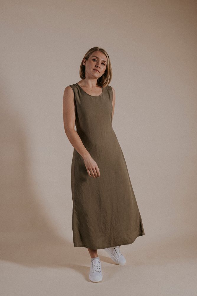 Woman in green linen dress, minimal fashion