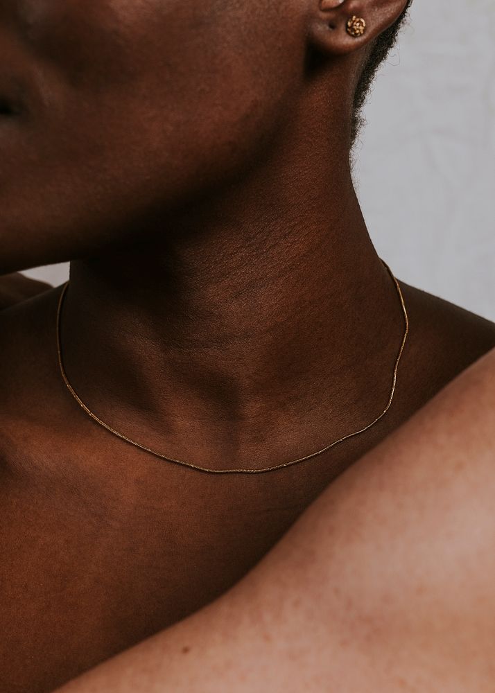 African woman, bare neck closeup photo