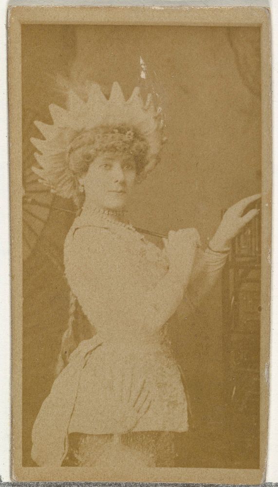 [Actress wearing pointed hat], from the Actors and Actresses series (N145-8) issued by Duke Sons & Co. to promote Duke…
