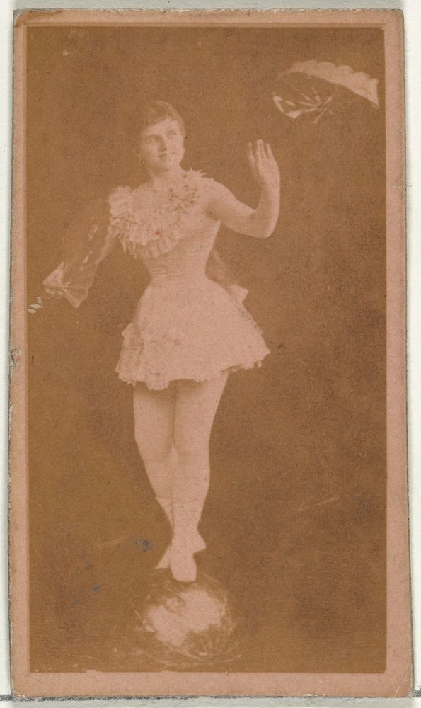 [Actress balancing on ball while holding fan], from the Actors and Actresses series (N145-8) issued by Duke Sons & Co. to…