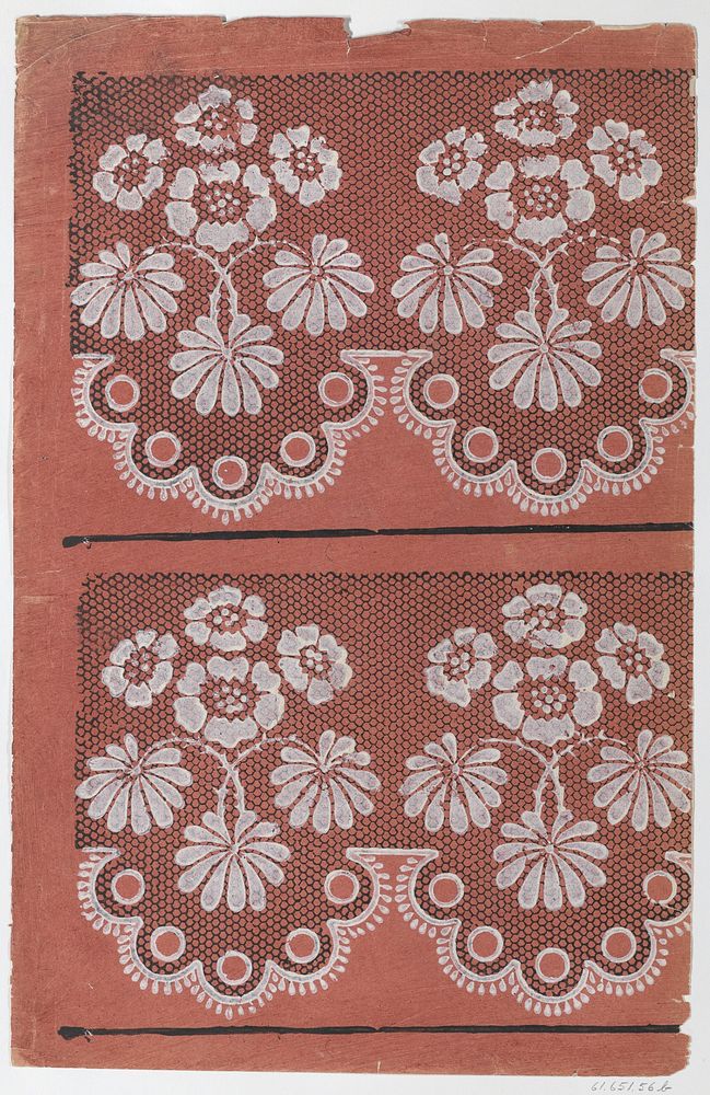 Red sheet with two borders with a white floral pattern atop a black lace pattern
