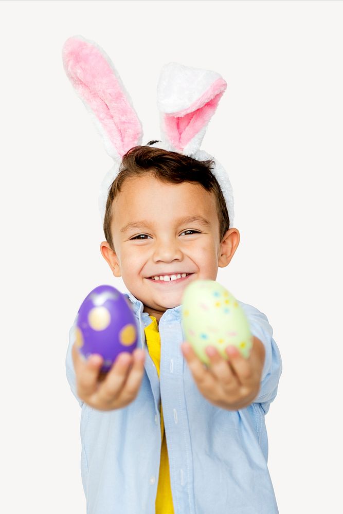 Little boy holding Easter eggs psd