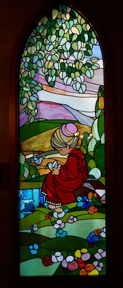                         An intricate and colorful stained-glass window at the Precious Moments Chapel near Carthage…