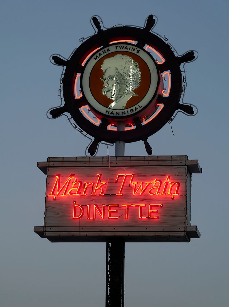                         Sign for the Mark Twain Dinette in Hannibal, a city along the Mississippi River in northeast…