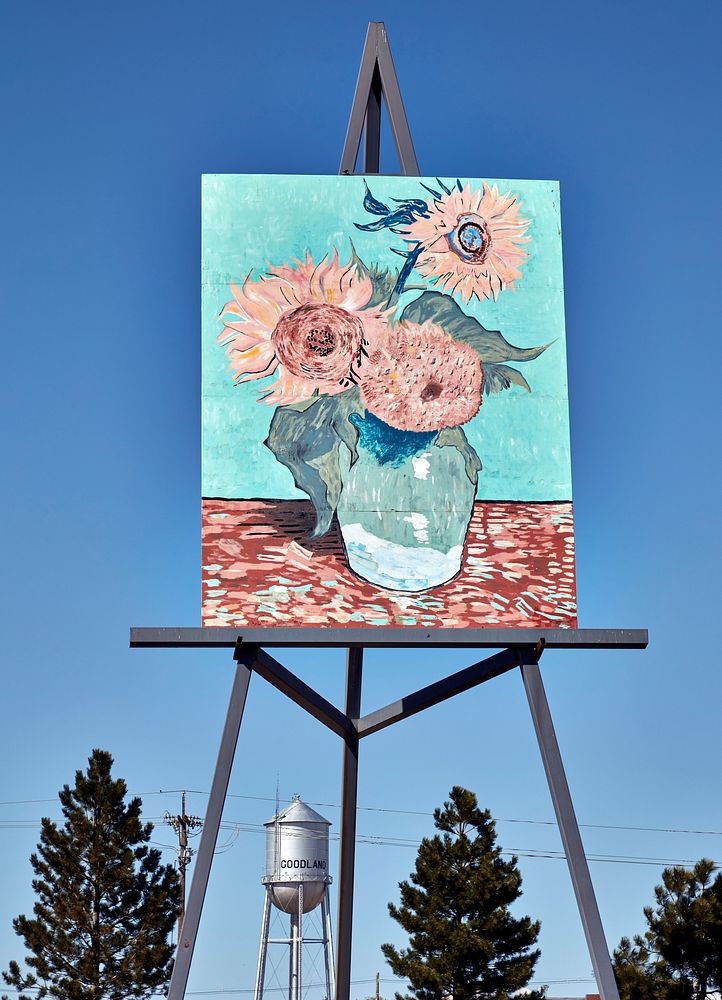                        A Vincent Van Gogh, sort of as it's a gigantic reproduction of his "Three Sunflowers in a Vase"…