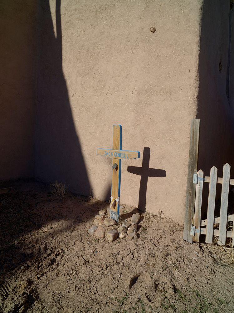                         Tiny churchyard gravesite at the San José de Gracia Church in Las Trampas, one of a string of…