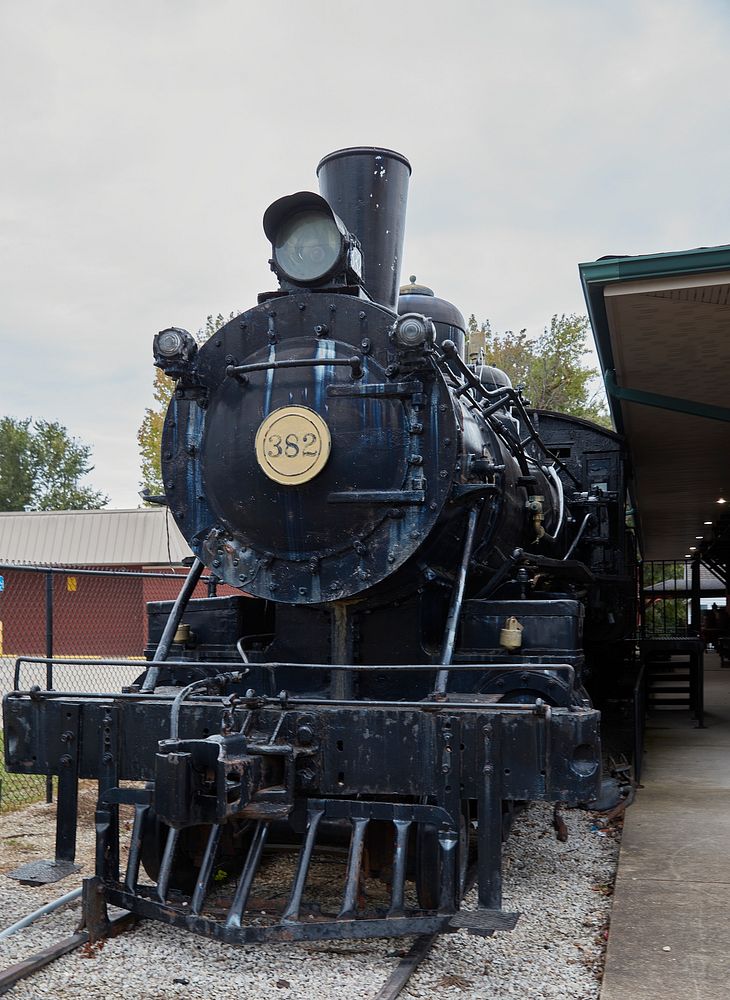 Steam locomotive outside modest home | Free Photo - rawpixel