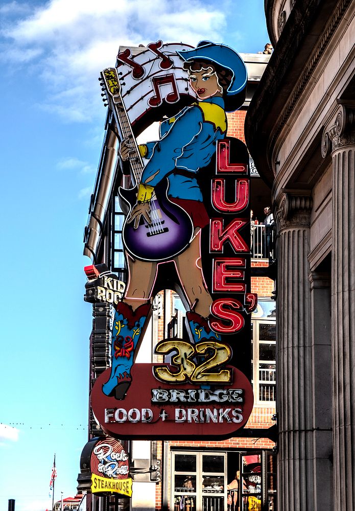                         Neon sign for Luke's 32 Bridge restaurant and bar in the raucous Lower Broadway district of…