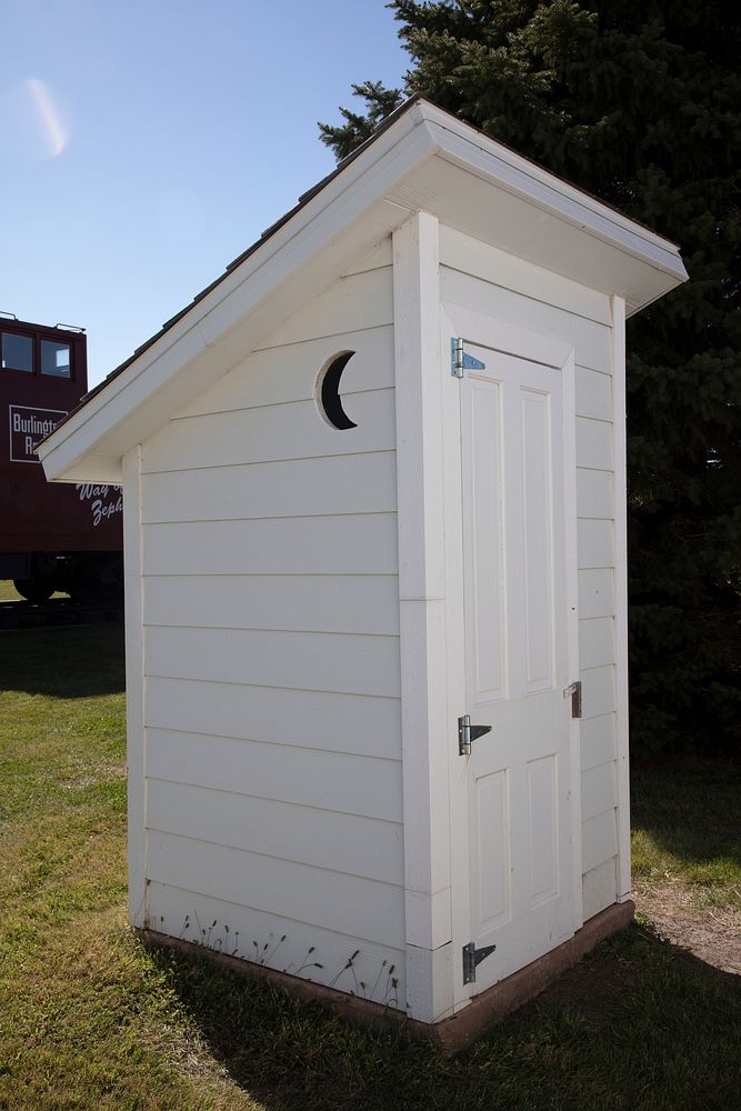                         A vintage outhouse, or outdoor latrine, at the Nebraska Prairie Museum in Holdrege, Nebraska        …