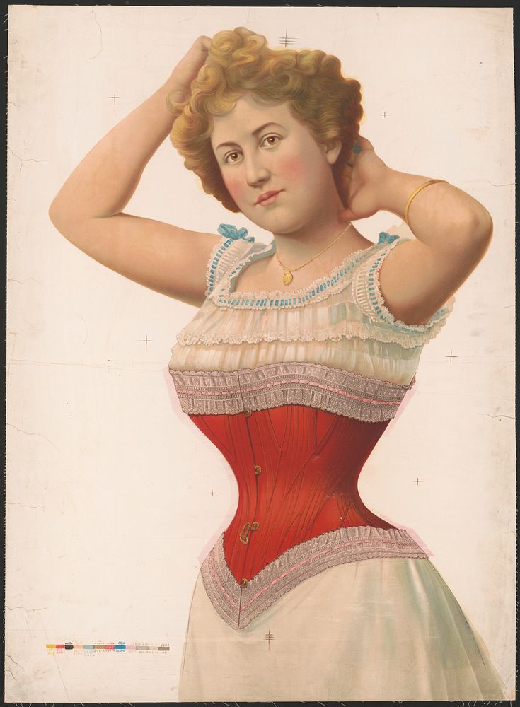 [Woman wearing a red corset with her arms raised to her head, showing off the corset and her shape]