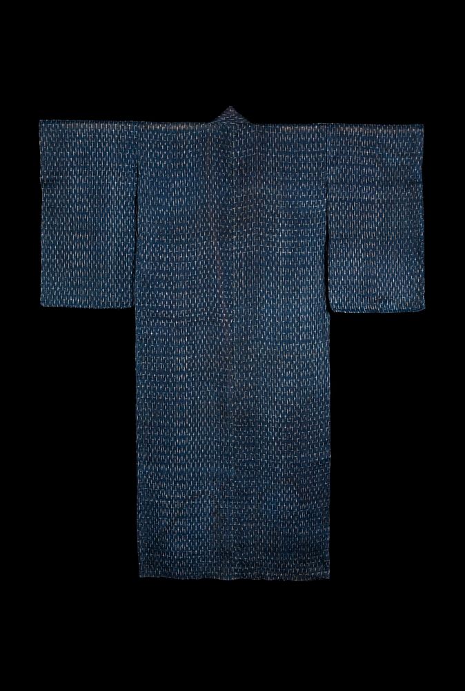 Dark blue-ground kimono with white ikat (kasuri) pattern made in Niigata Prefecture during late 19th–early 20th century…