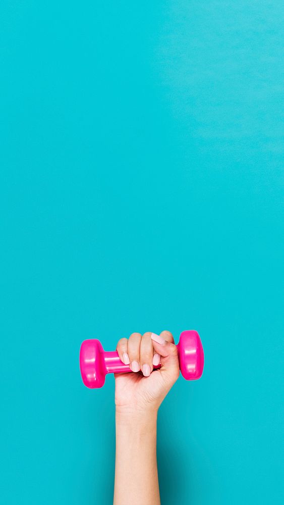 Woman's hand holding dumbbell, healthy lifestyle psd