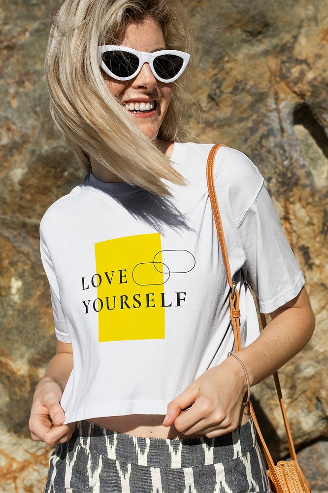 White t-shirt mockup psd with love yourself quote beach apparel shoot