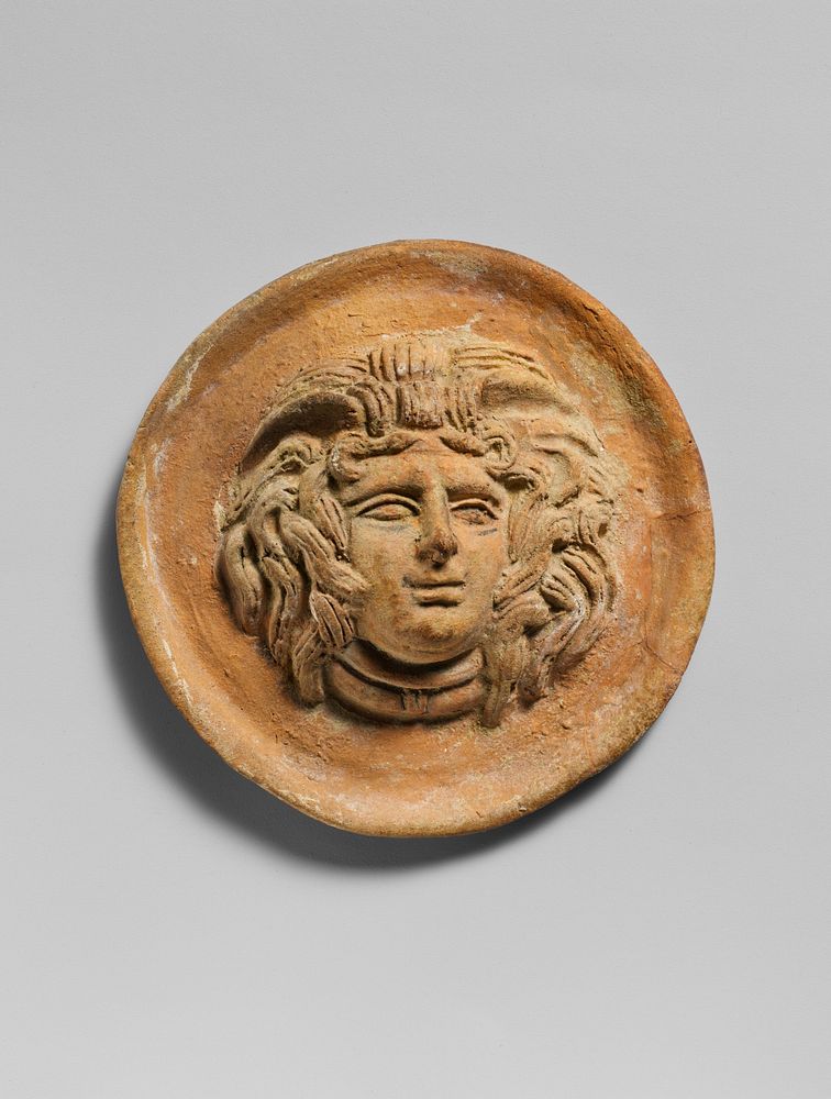 Terracotta reilef roundel with head of Medusa, Greek