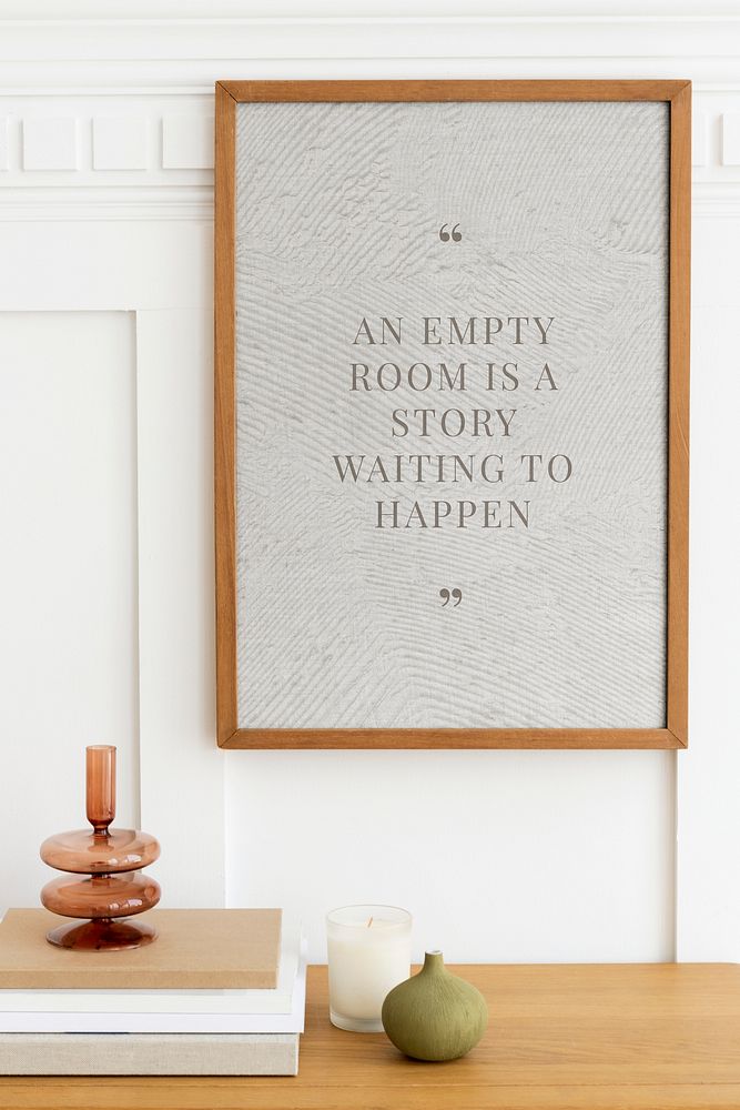 Picture frame mockup psd hanging in a minimal room
