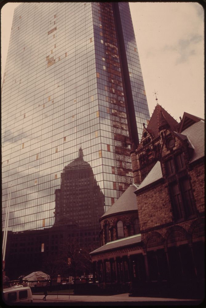 The Old John Hancock Building Is Reflected in the Glass Front of the New John Hancock Building, Boston. Original public…