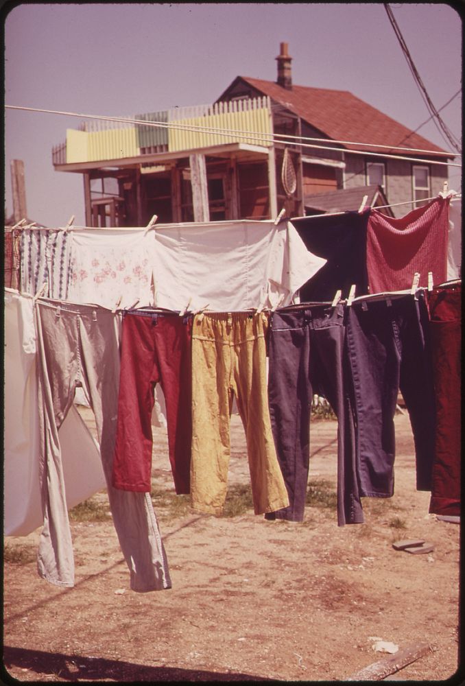 Clothes drying on rack. Original public domain image from Flickr