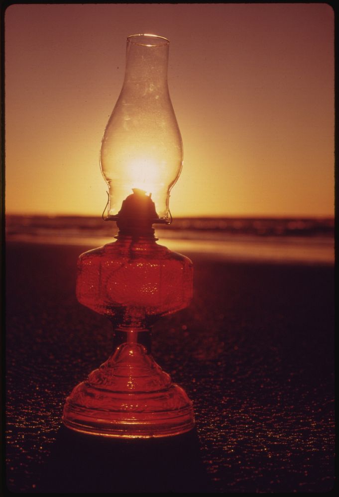 The Setting Sun and Glass Lantern, Symbols of Solar Energy and Manmade Lighting, Along the Oregon Coast near Lincoln City…