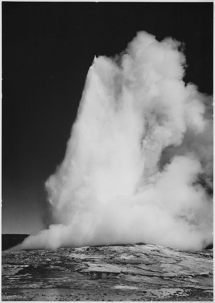 Taken at dusk or dawn from various angles during eruption. "Old Faithful Geyser, Yellowstone National Park," Wyoming.…