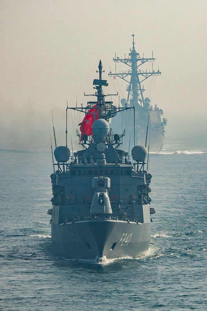 BLACK SEA. The Turkish Naval frigate TCG Yavuz (F 240) and the Arliegh Burke Guided class guided missile destroyer USS…