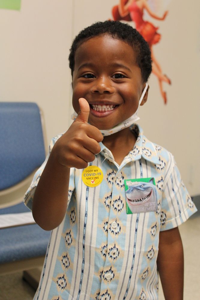 First under 5 COVID vaccine at NHC Pax River 220720-O-YW562-967Samuel Thomas, age 4, gets his COVID-19 vaccination on…