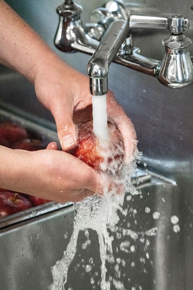 Washing apples, fresh fruit.