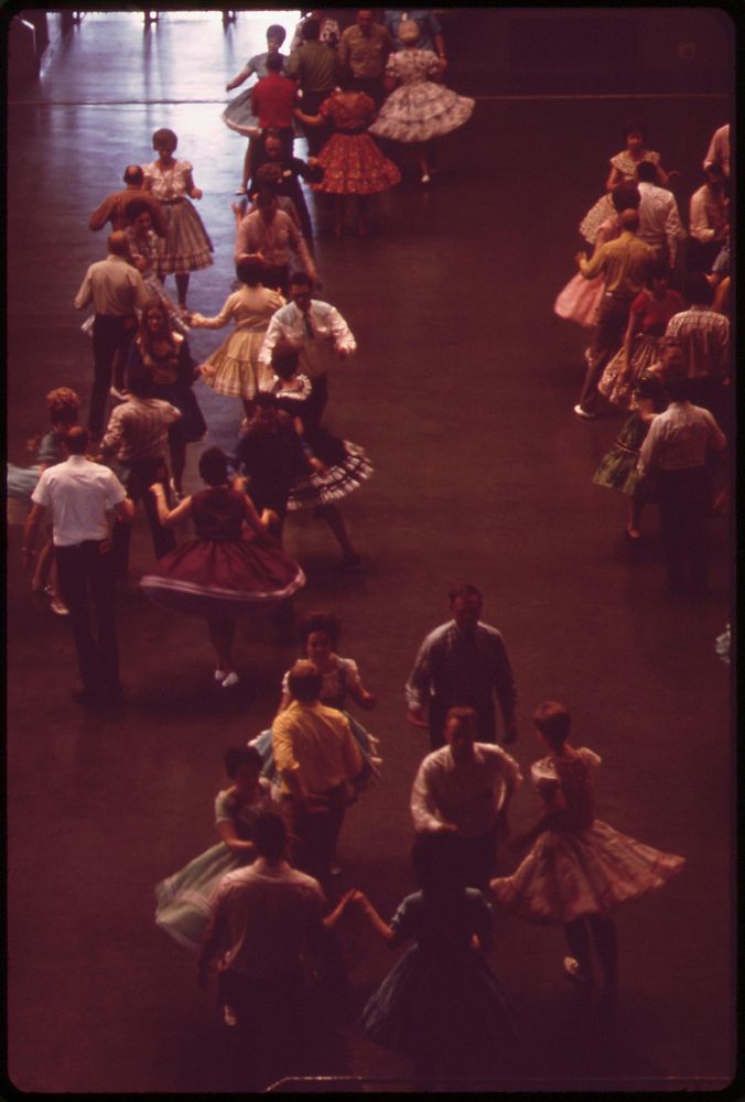 Couples take their places in the 33rd Annual Square Dance Festival, held in the Pershing Auditorium, May 1973. Photographer:…