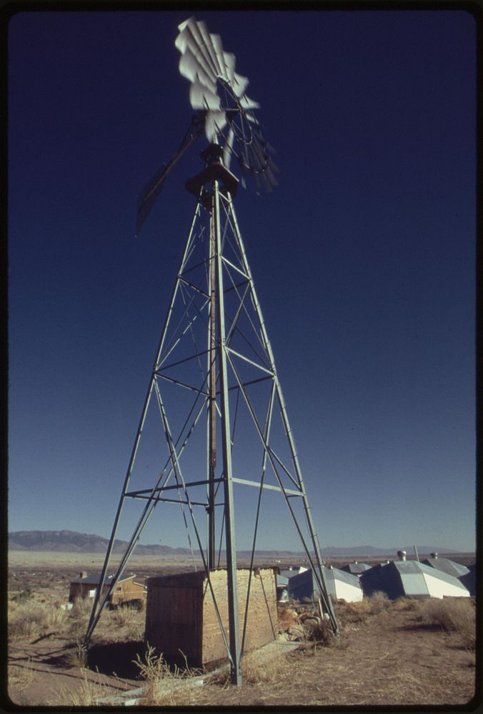 Windmill at a home near Albuquerque, New Mexico, is used to pump water for domestic use. Future plans include the use of…
